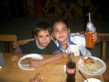 Mauricio, Miguelito, pupusas and pop.JPG